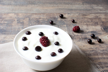 Natural yogurt with fresh berries and cereals
