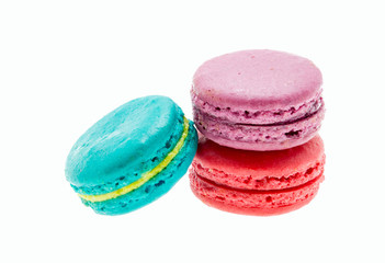 Colorful macarons on white background. Macaron or Macaroon is sw