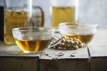  Cup of Healthy Tea over wood background