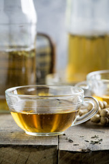  Cup of Healthy Tea over wood background