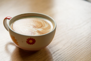 Hot Coffee Art on wood table.