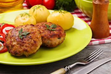 Fresh, homemade meatballs, served with tomato salad and new pota