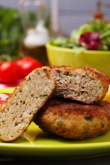 Fresh, homemade meatballs, served with tomato salad and new pota