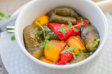Roasted yellow, red and green bell pepper with thyme