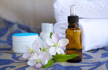 A dropper bottle of apple blossoms extract