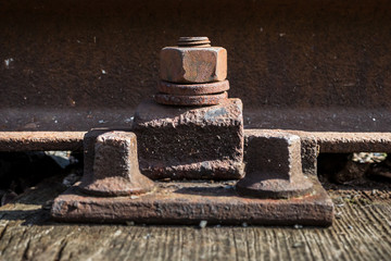 old rusted screw. rusty railroad.aged metal.