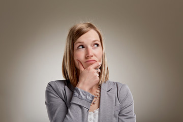 Uncertain young blond woman