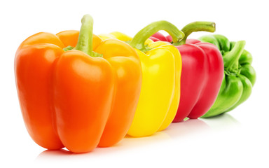 red, yellow, orange and green pepper isolated on the white backg