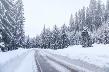 Snowy winter road in Julian Alps