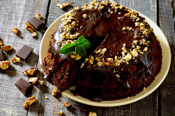 Chocolate cake with nuts in a rustic style