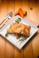 strudel stuffed with chopped meat pumpkin and herbs