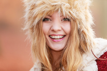 Portrait of pretty fashion woman in fur winter hat