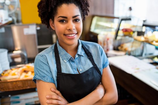 Pretty waitress smiling at camera