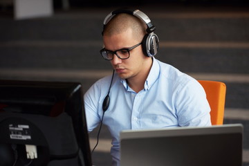 startup business, software developer working on computer