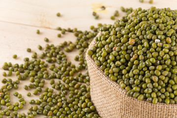 green beans on wood background