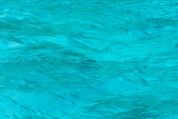 Blue ripple water wave in sea ocean.