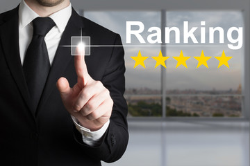 businessman pushing button ranking five rating stars - obrazy, fototapety, plakaty