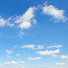 Naklejka na ściany i meble light cumulus clouds in the blue sky