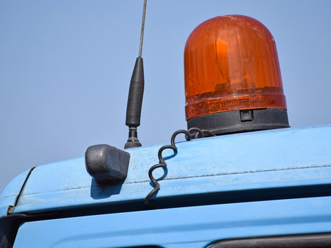 Siren Lamp And Antenna On The Top Of A Truck