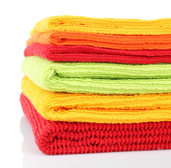 Colorful towels isolated on white