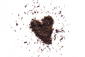 dry black tea in heart form
