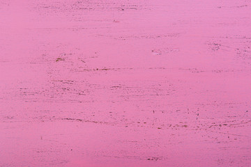 Pink rustic wood background.