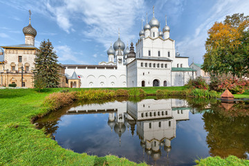 Fototapeta na wymiar Reflection of church in pond in Rostov Kremlin