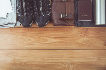 Vintage tone of Packed suitcase of vacation items, top view