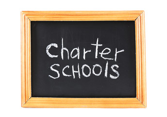 Obraz premium Charter Schools written on chalkboard