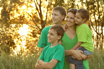 Family resting in  summer park