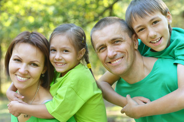 Family resting in  summer park