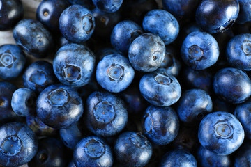 Heap of tasty ripe blueberries close up
