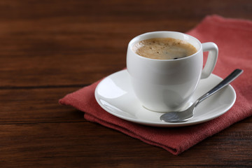 Cup of coffee on table close up