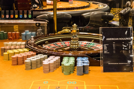 Gambling casino table, American roulette, play counters