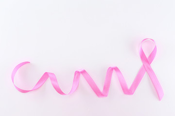 Pink ribbon sign isolated on white