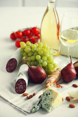 Still life with various types of Italian food and wine