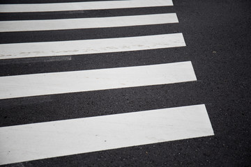Pedestrian crossing, zebra traffic walk way on asphalt road