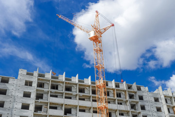 Multistory building and powerful crane