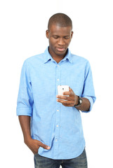 Handsome African American man holding mobile phone isolated on white