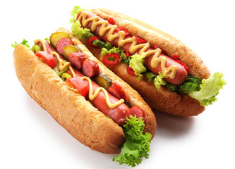 A pair of fresh hot dogs isolated on white