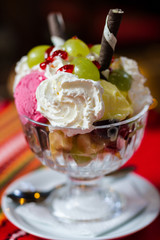 Delicious vanilla sundae with strawberry