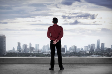 Business Person Standing On The Rooftop