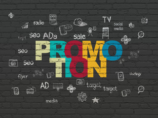 Advertising concept: Promotion on wall background