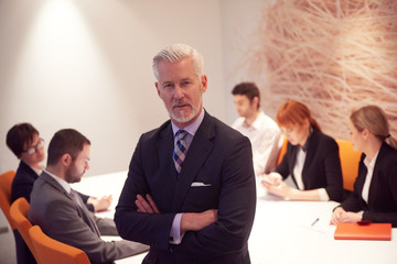 senior business man with his team at office