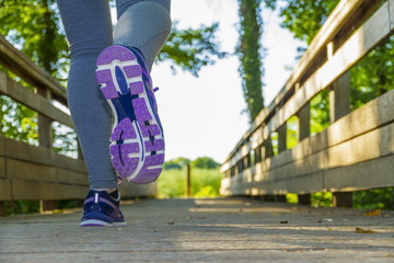 Woman running in a field