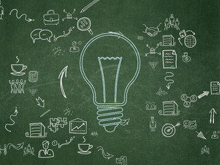 Finance concept: Light Bulb on School Board background