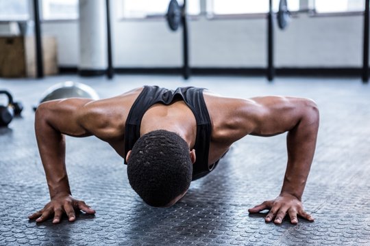 Fit man working out in studio
