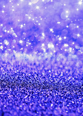 Blue defocused glitter background