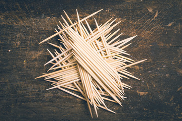 Many toothpicks tightly piled together facing different