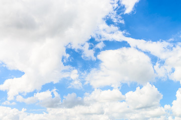 Naklejka na ściany i meble White cloud on blue sky background